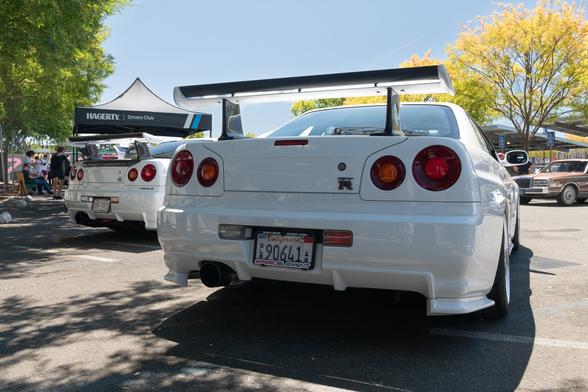 Two white Japanese sports coupes