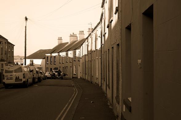 monochrome picture of an empty street in the town of Holy Head on Anglesey, Wales
