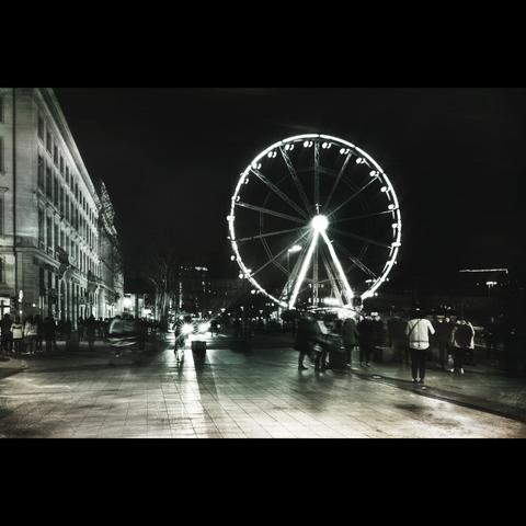 forrain wheel in the city light, a night in the winter, Lyon 69002, Place Bellecour , France