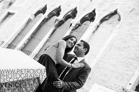 A couple enjoys a moment in Venice. Getting lost is all you need to fully enjoy this city.