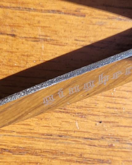 Metal edge showing fresh metal, even surface