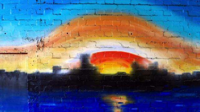 Painted rainbow puzzle from Coldplay song in email link