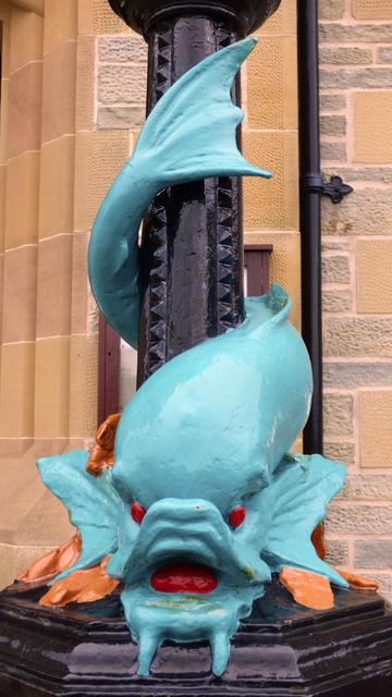 stylised dolphin ornaments a street lamp