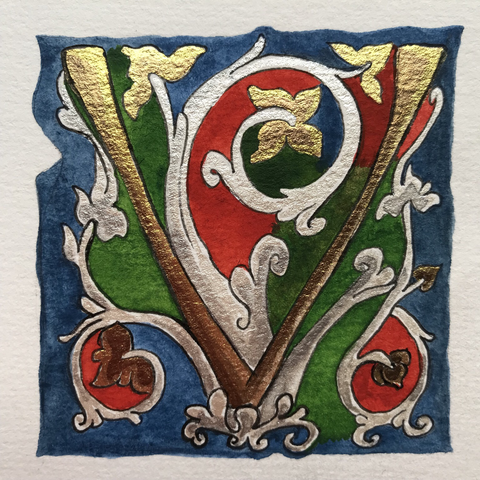 Golden V letter with ornaments in a medieval style