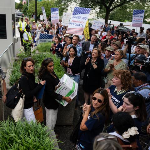 Departing State Department workers outside the agency’s building in Washington this month.