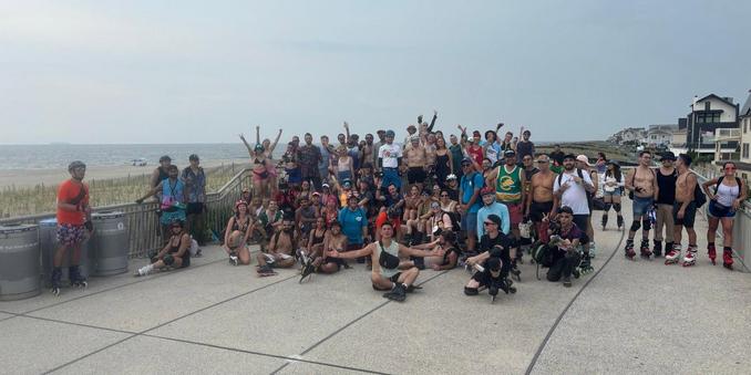Group of skaters on the Rockaway Beach boardwalk.