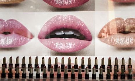 shop window with large lips photos and rows of lipsticks