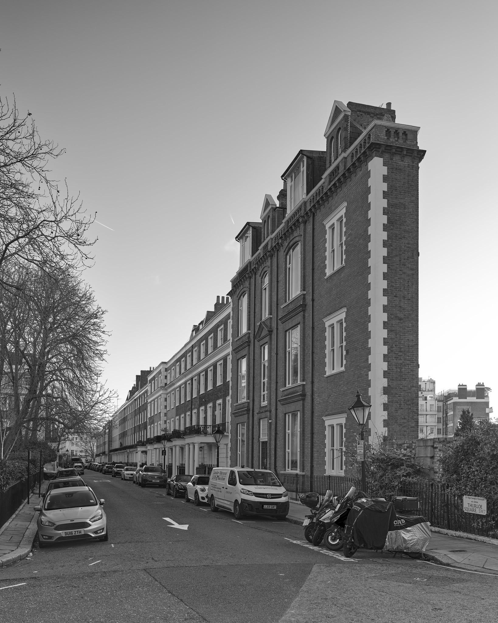 An apparently improbably shallow row house at the end of a residential street.