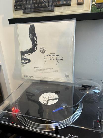 Adolf Noise's (aka DJ Koze) maxi single "Rammelwolle Remixe" playing on my record player.