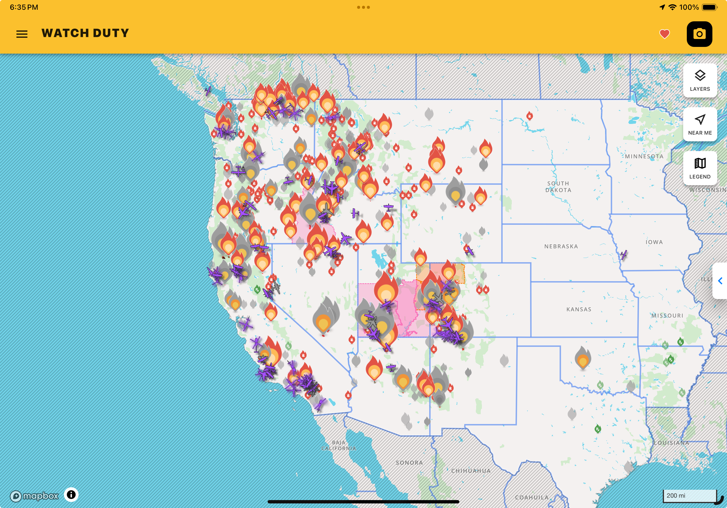 screen snapshot of “watch duty” app showing map of western US covered in fire sites