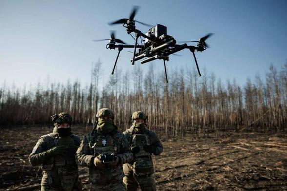 Illustrative image: Ukrainian soldiers of Separate Presidential Brigade "Hetman Bohdan Khmelnytskyi" test a drone to hunt Russian drones in Winter 2025 in Donetsk Oblast, Ukraine. At the bottom of the drone, guiding tubes are attached - smoothbore guns that shoot at enemy drones in flight