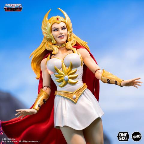 Close shot of the She-ra figurine, using a different face accessory, this time showing her smirking up close while the details of her white dress and the yellow gold details of her accessories are more clearly visible.