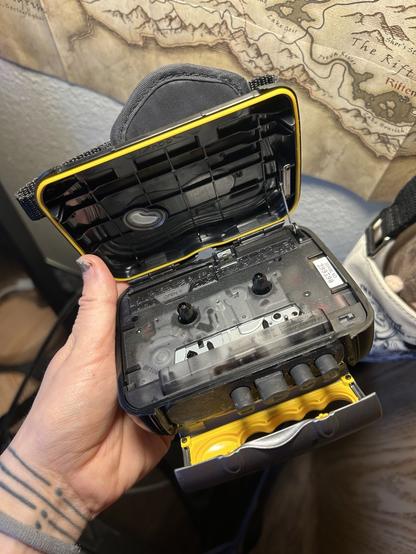 Sony Sports walkman fully open, showing off it’s see through cassette tape player inside