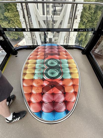 The seat was more like a table. The photo on it promised softness, like a sofa, but, alas, it was just a photo of upholstery.