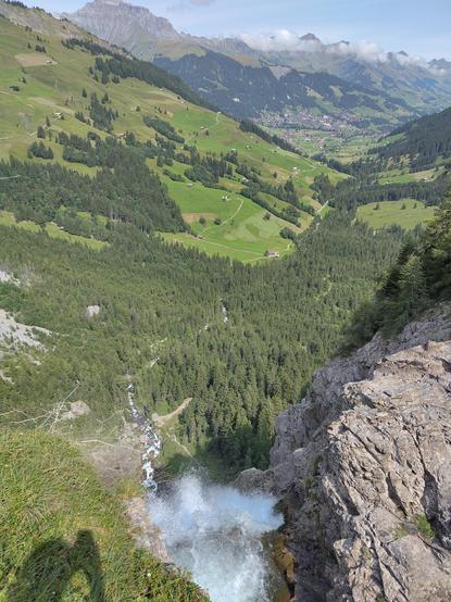 View from the middle of the waterfall where the water is flowing into free air