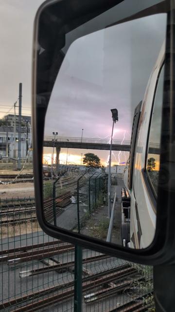 Thunder in the rearview mirror of my truck