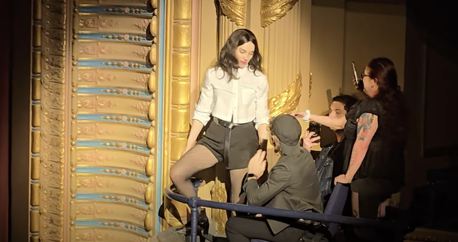 St Vincent after climbing from a speaker onto the balcony