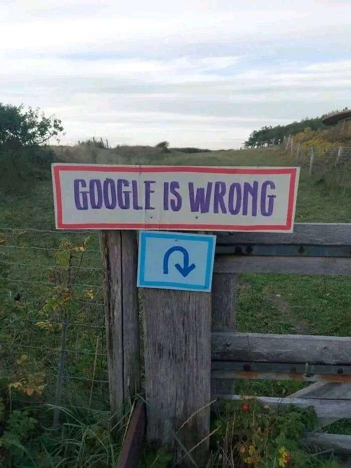 Photo of a fence to someone's yard that has a sign that says, "Google is wrong ⭛"