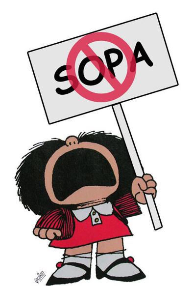 Mafalda con un cartel de prohibido la sopa.