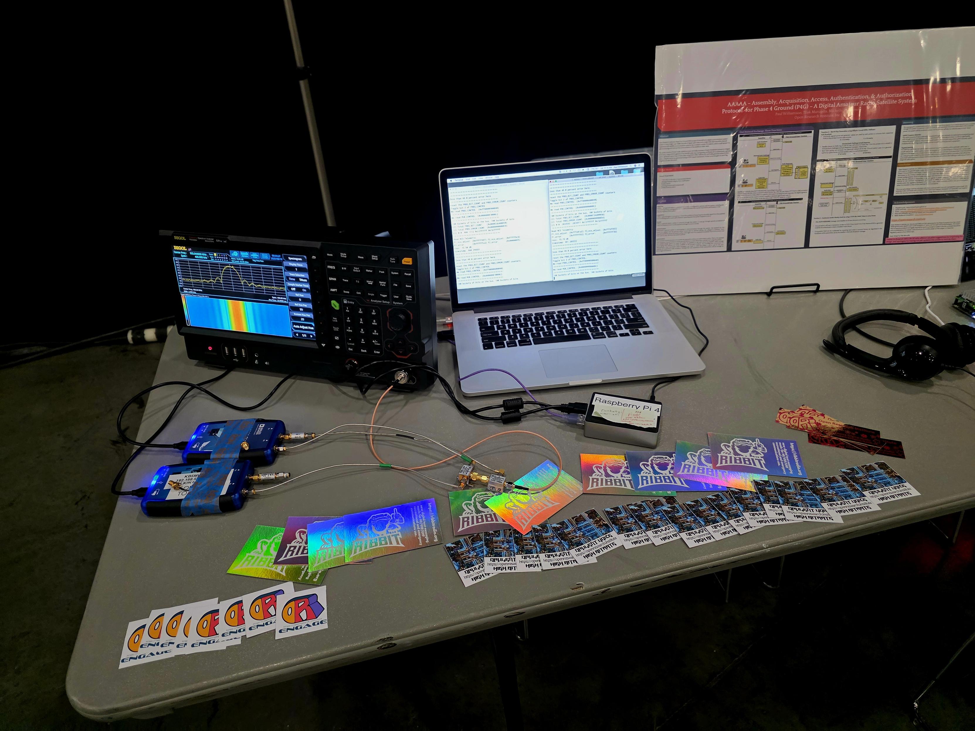 Locutus demo, which is the HDL modem design for Opulent Voice. This is a spectrum display of the signal produced by a Pluto SDR, and the transmit and receive statistics from the pseudo random binary sequence being transmitted.