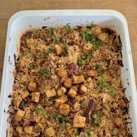 The biryani in the oven dish, ready to be eaten.
