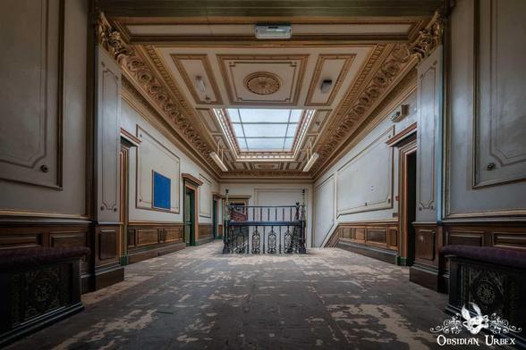 upper floor landing with ornate ceiling
