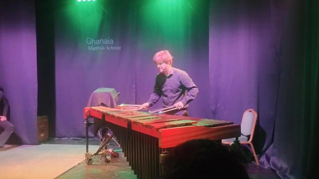 A musician playing a marimba on stage at the Edinburgh Fringe
