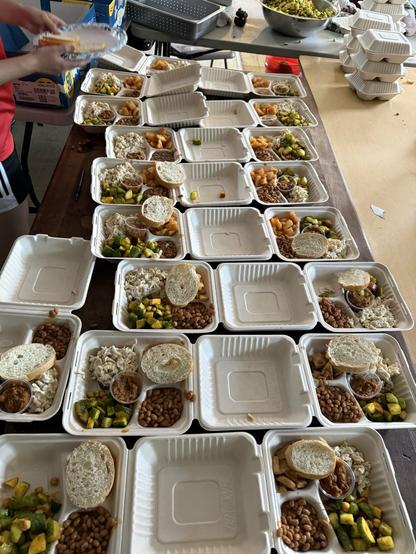 Our classic row of clamshells being dished out. A lot of it came from donated garbage plates, including vegan garbage plates!