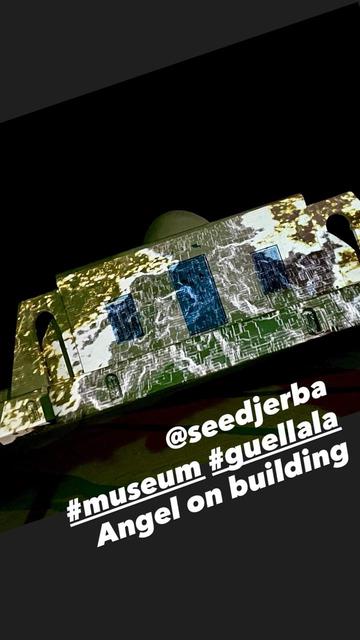 Video with abstract structures on small white building @seedjerba #museum #guellala Angel on building