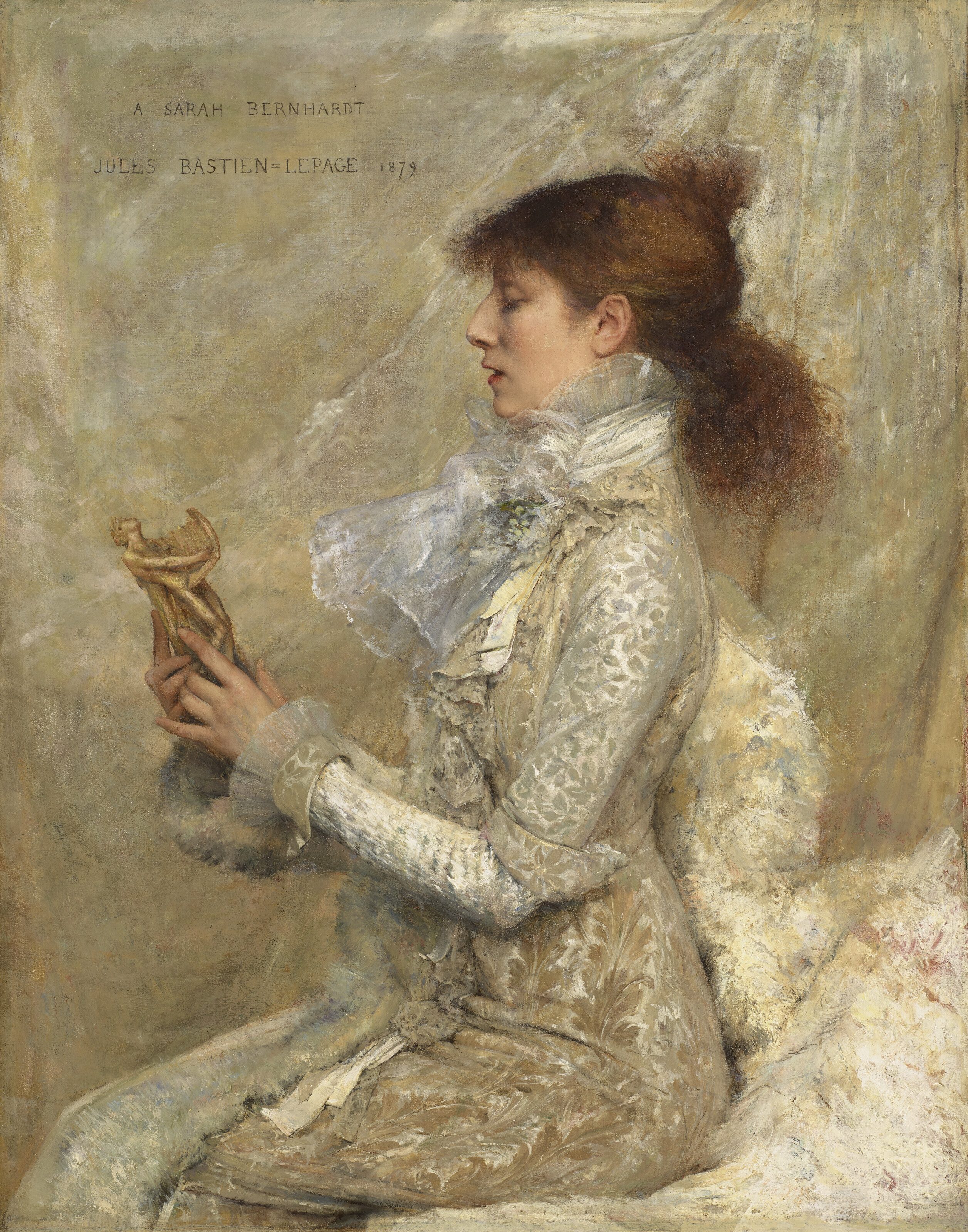 Excerpt from the Lot Essay: “… in profile to focus on her form - clad in figure-hugging silk brocades, offset by an extravagant chiffon bow at the neck. Surface, thus exposed, contained soul. The eye ranges freely over the narrow seventeen-inch waist, the ramrod line of her back, the measurement between ear, nose and mouth, carefully calibrated, and the shock of unruly tresses tamed, it was said, by no more than two pins. By its very nature, a profile is more intimate than a full face; we observe without being observed. The mask is not in place and the eyes do not distract. In this instance, they cast their gaze upon a sculpture as a connoisseur might, and the piece Mlle Bernhardt delicately fingers is that of Orpheus, given to her to hold at this moment by Bastien-Lepage, in order to compliment and express her aspirations as a sculptor.”