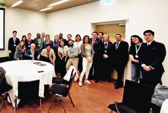 Participants of the WSIS conference posing for a picture