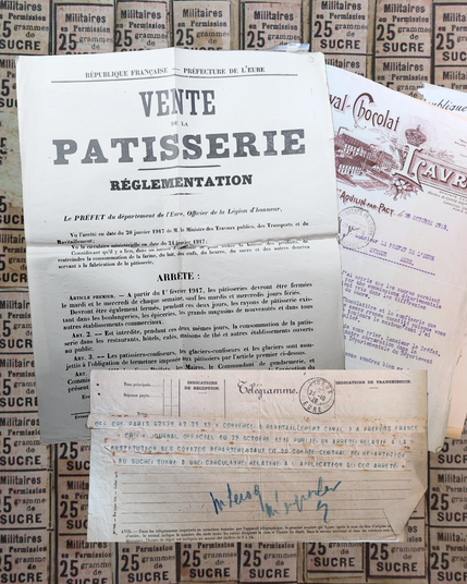 Pèle mêle de documents, une affiche réglementant la vente de pâtisseries, un télégramme et de la correspondance.
