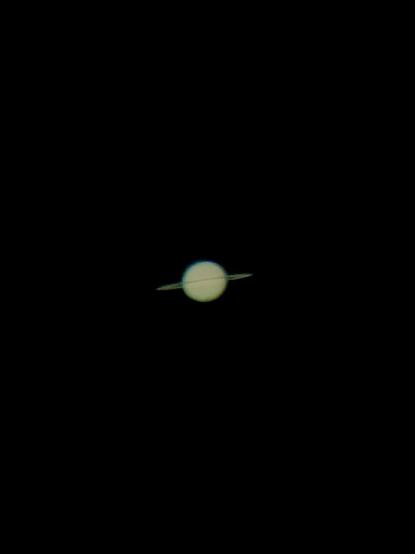 A golden Saturn is visible with reduced contrast and the edge of the rings are clearly visible against the planet's body. The rings appear a little fainter and the edge line across the planet appear like a super thin line across the planet body.

A little fuzzy due to atmospheric conditions but this fall and winter cooler colors should afford better pictures!