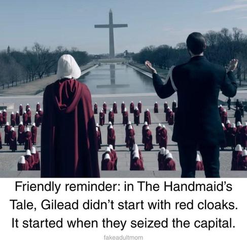 Generated photo of a male leader, from behind, , hands raised on the steps of the Lincoln Monuement, looking down the reflection pool, a giant cross at the end.   Next to him a handmaiden in red cloak and white headdress, below, maidens lined up.

Friendly reminder: in The Handmaid’s
Tale, Gilead didn’t start with red cloaks.
It started when they seized the capital.