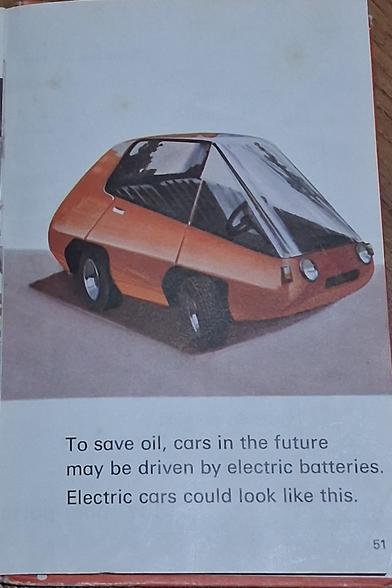 A page from the Ladybird Book of Cars showing an artist impression of a tiny red car. The text reads
To save oil, cars in the future may be driven by electric batteries. Electric cars could look like this.