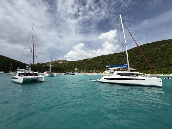 Sailboats on moorings in White Bay Jost Van Dike along the beach