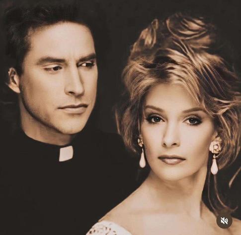 Close-up from the Soap Opera Weekly possession issue: Father John Black in clerical collar gazes longingly at Marlena Evans, possessed by the Devil but dressed in divine glamour. Her earrings sparkle, her expression is seductive and knowing. The tension is palpable—lust, guilt, and supernatural chaos collide in one unforgettable frame.