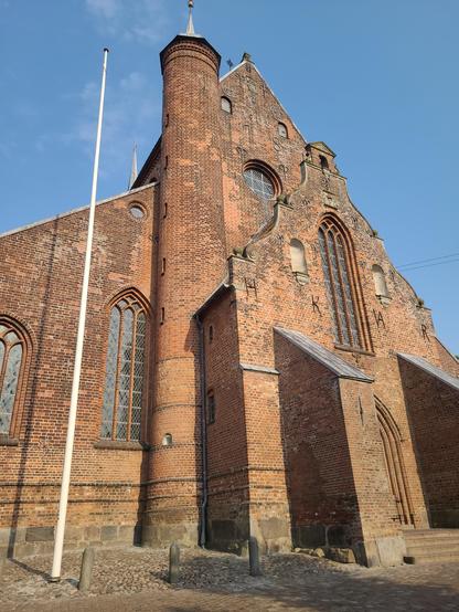 The Haderslev cathedral. Picture taken from an uoward angle and it ahows the front of the building.