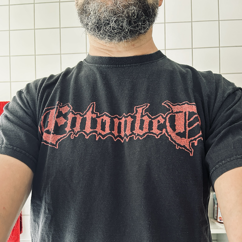 Me wearing an Entombed Bandshirt showing only the print and upper part of my torso.