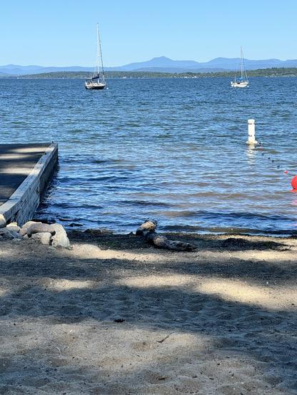 A beach & lake champlain
