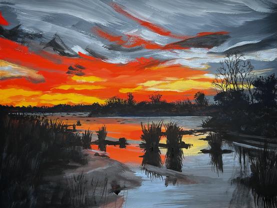This painting depicts a dramatic sunset over a marshland. The sky dominates the scene with sweeping strokes of fiery red, orange, and yellow near the horizon, blending upward into cooler grays and deep blacks of heavy clouds. The vivid sunset colors are reflected in the still surface of the water, intensifying the sense of light and contrast. Dark silhouettes of grasses, reeds, and bare trees frame the scene, with clusters of marsh plants breaking the water’s reflection. The overall atmosphere is moody and striking, capturing the fleeting, powerful glow of twilight in a natural wetland setting.