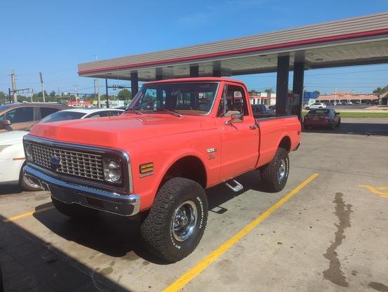 70sish Chevrolet Cheyenne truck. Safety orange