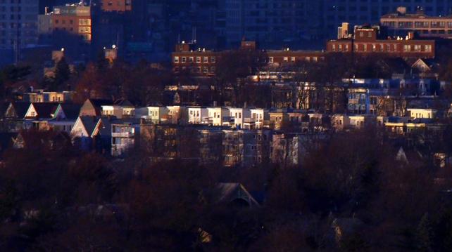 Two rows of houses on Draper St, Dorchester MA (6.27 mi) photographed from Buck Hill.