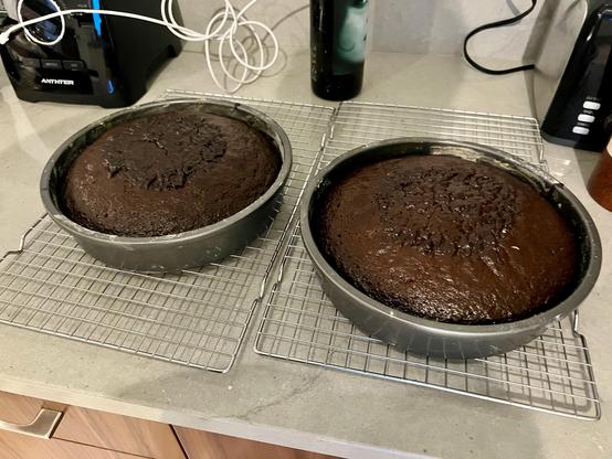 cake pans just out of the oven waiting 2 minutes before removing cake from the cake pans