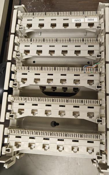 A BIX style RJ-45 panel. I had no idea these things even existed.