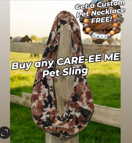 Our brown, black and tan cow print CARE-EE Me Pet sling hanging on a fence post in a field.

Buy any size CARE-EE ME Pet Sling and get a custom pet necklace FREE!