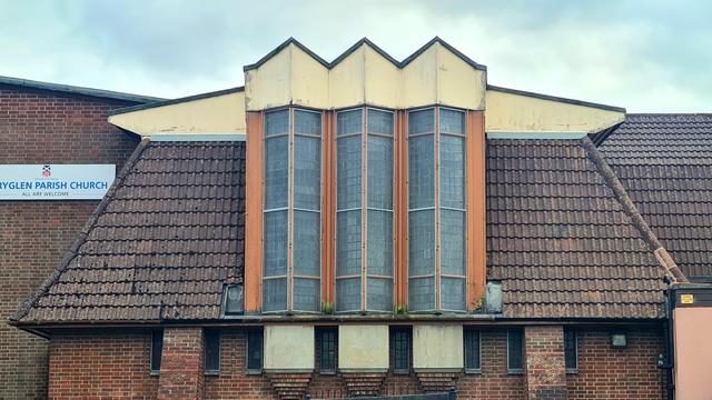 An unusual set of tall, concertinaed dormer windows on a 1950s Glasgow church.