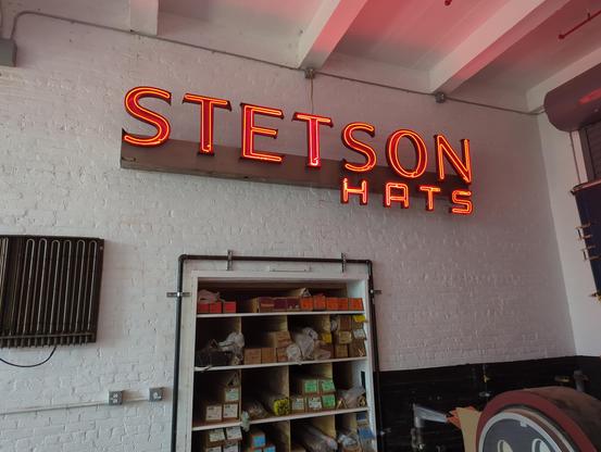 The neon bending room in the new Brooklyn shop. Dave is fond of old signs, and I do dream of one day owning a Stetson hat. I do wish that glass cubby encompassed the entire wall, but the shop should be nice an efficient.