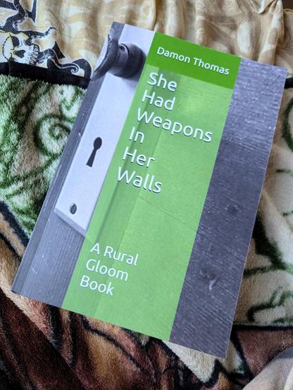 She Had Weapons In Her Walls is the newest of the Rural Gloom works by Damon Thomas