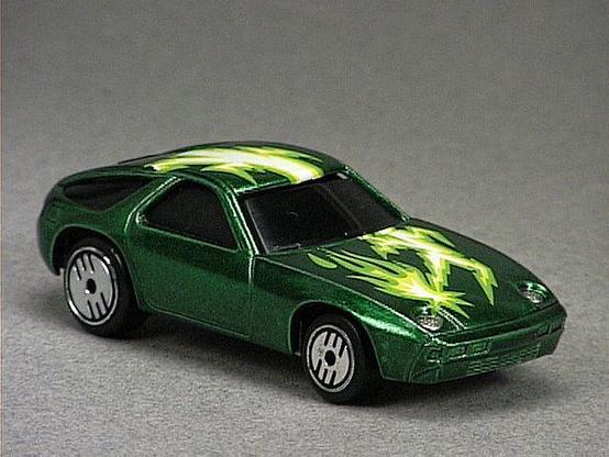 Released in 1984, Metal Flake Green Predator of 1984 Hot Wheels with Ultra Hot wheels. Notes: Based on the Porsche 928. Tampo: Light green, yellow and white lightning bolt on top and hood. Packaging: 1984 Blister. Metal Body, Metal Base. Made in Hong Kong. Scarcity: 2/10